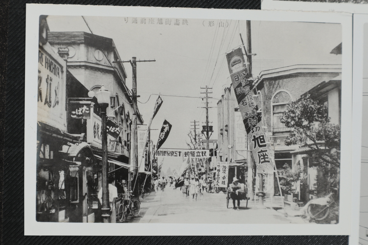 〔写真〕昔の街並み 映画街旭座前通り